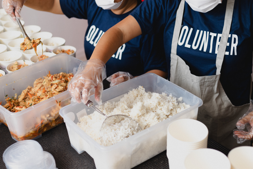 Volunteers Preparing Food for Distribution